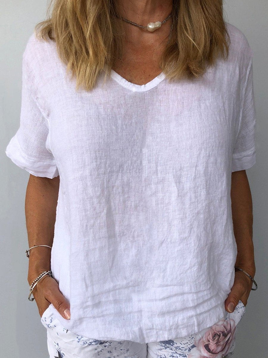Stilfull og allsidig dametopp, ideell som sommer topp for en casual look. Regular lengde.