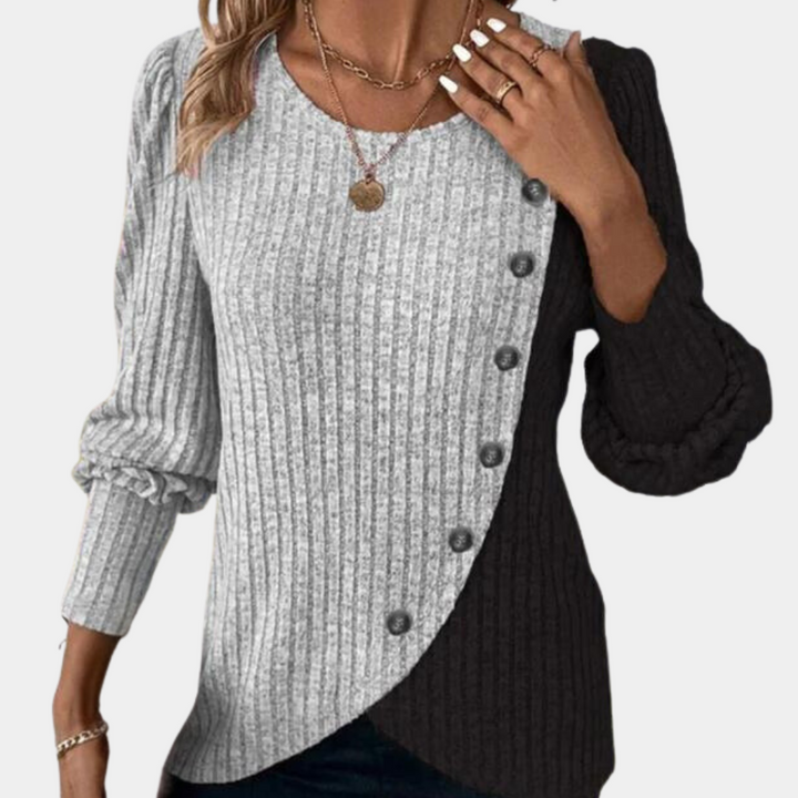 Komfortabel kvinnegenser i myk strikk, ideell for casual look og kalde dager. En allsidig overdel i damekolleksjonen.