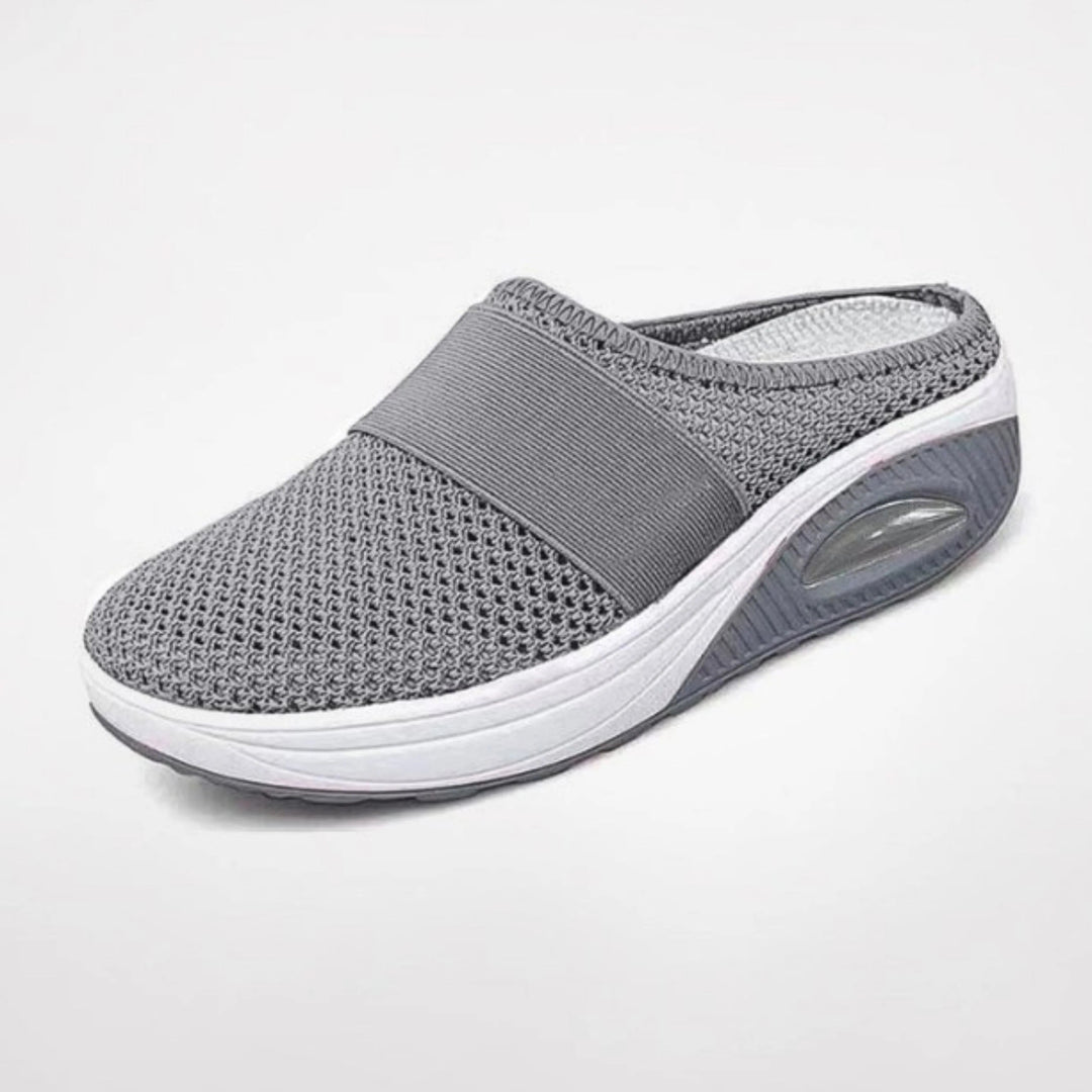 Et par komfortable kvinnesko, perfekte innendørssko med støtdemping og ergonomisk design.