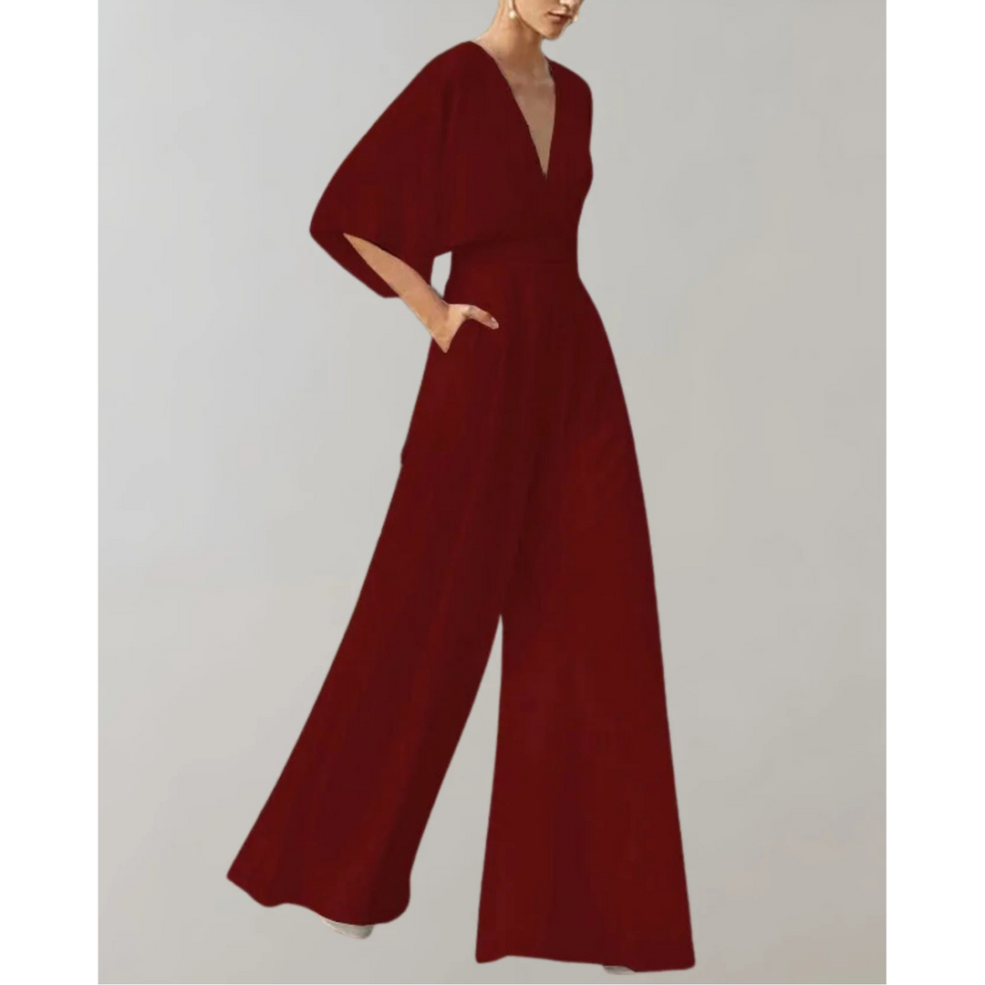 Moderne damejumpsuit med elegant snitt og flatterende passform, et perfekt valg for kontor og fest.