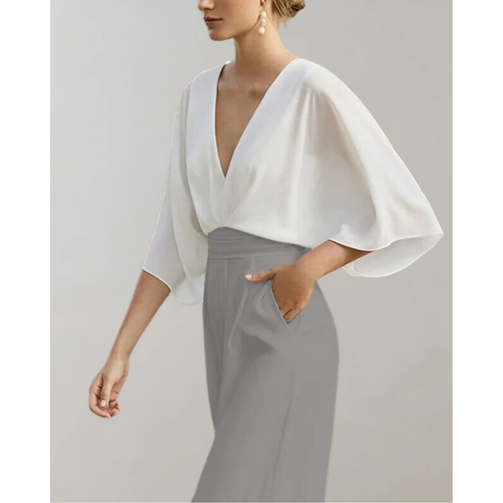 Tidløs kvinners jumpsuit; elegant og komfortabel med et flatterende snitt for enhver anledning.