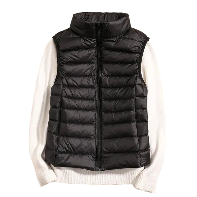 Kvinners lett puffervest med glidelås. Varm og stilfull lagpålag vest for vinteren.