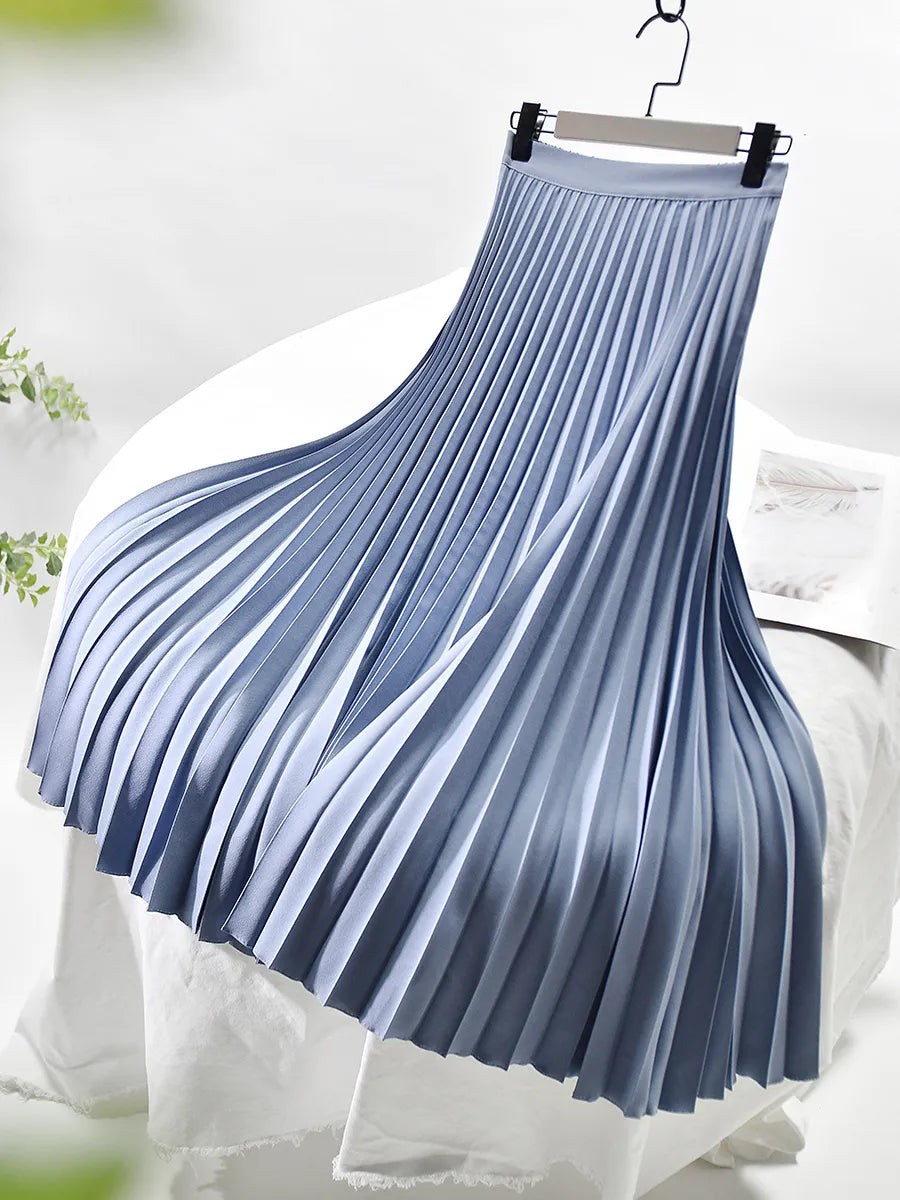 Flott plissert maxiskjørt. Et must for kvinners garderobe, passer for både fest og hverdagsmote.