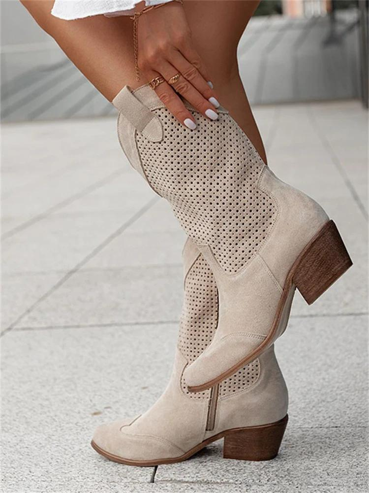 Komfortable kvinners western støvler, mid-length design. Stilige boots for en elegant og avslappet look gjennom høsten.