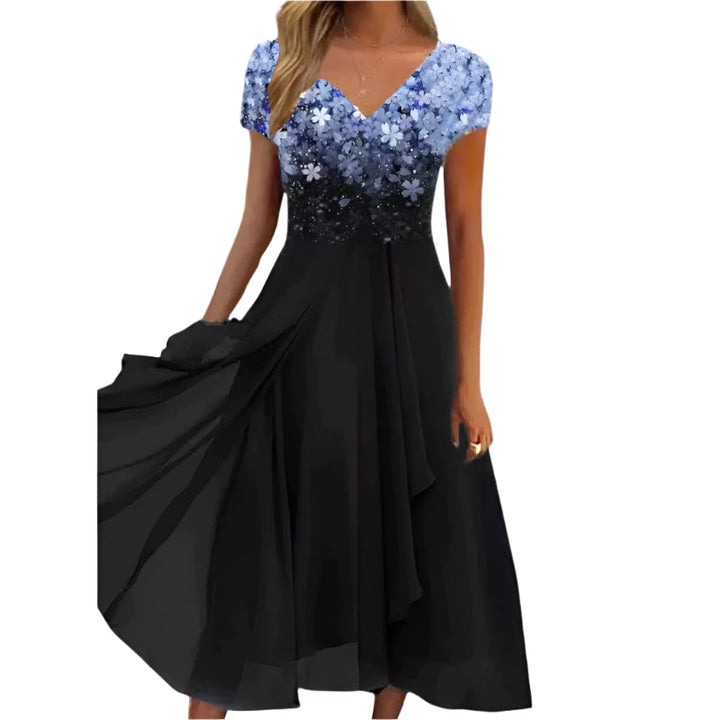 Elegant blomstret midi kjole for kvinner med flatterende passform og v-hals, perfekt som sommerkjole.