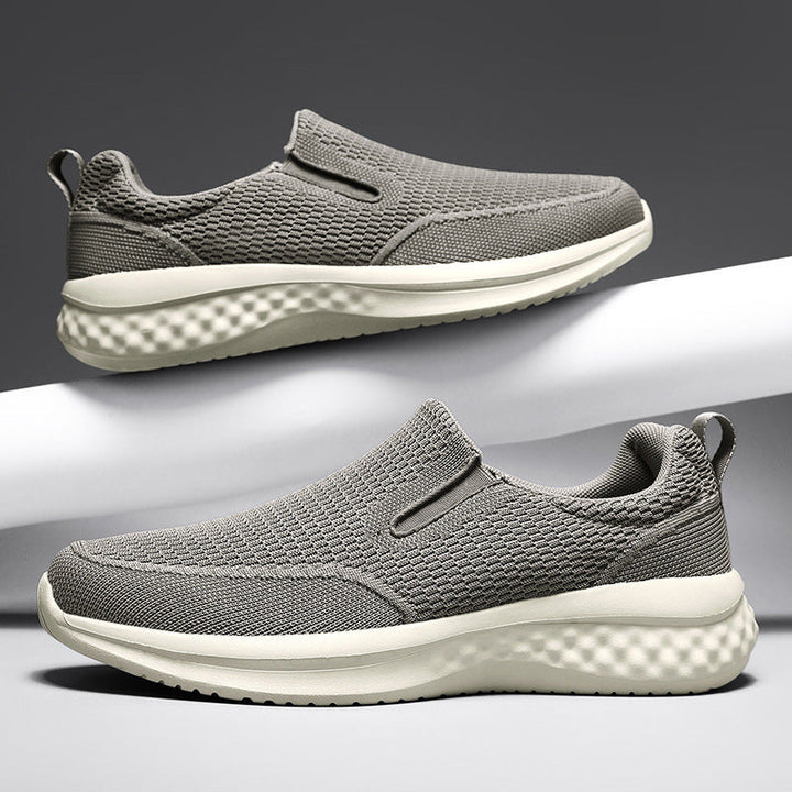 Ultra-komfortable og lettvekt menns slip-on sko. Pustende joggesko for lange dager.