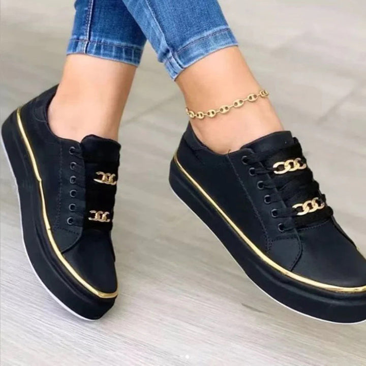 Allsidige dame joggesko med moderne design og gull detaljer. Komfortable kvinners sneakers for fritid.