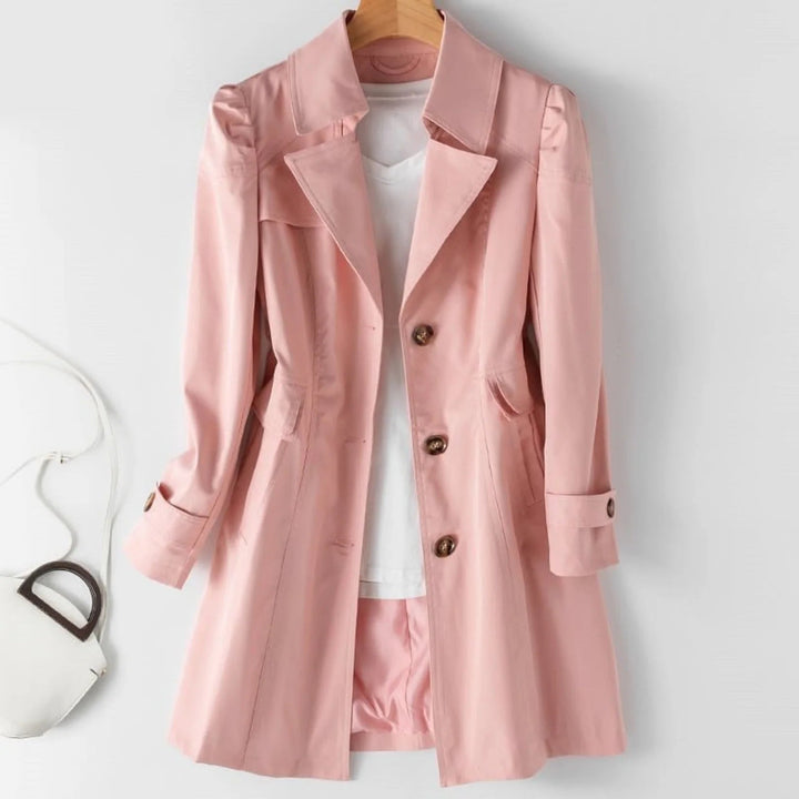 Stilig rosa lang kvinne trenchcoat. Elegant ytterjakke som gir tidløs moteklær for vår og høst.