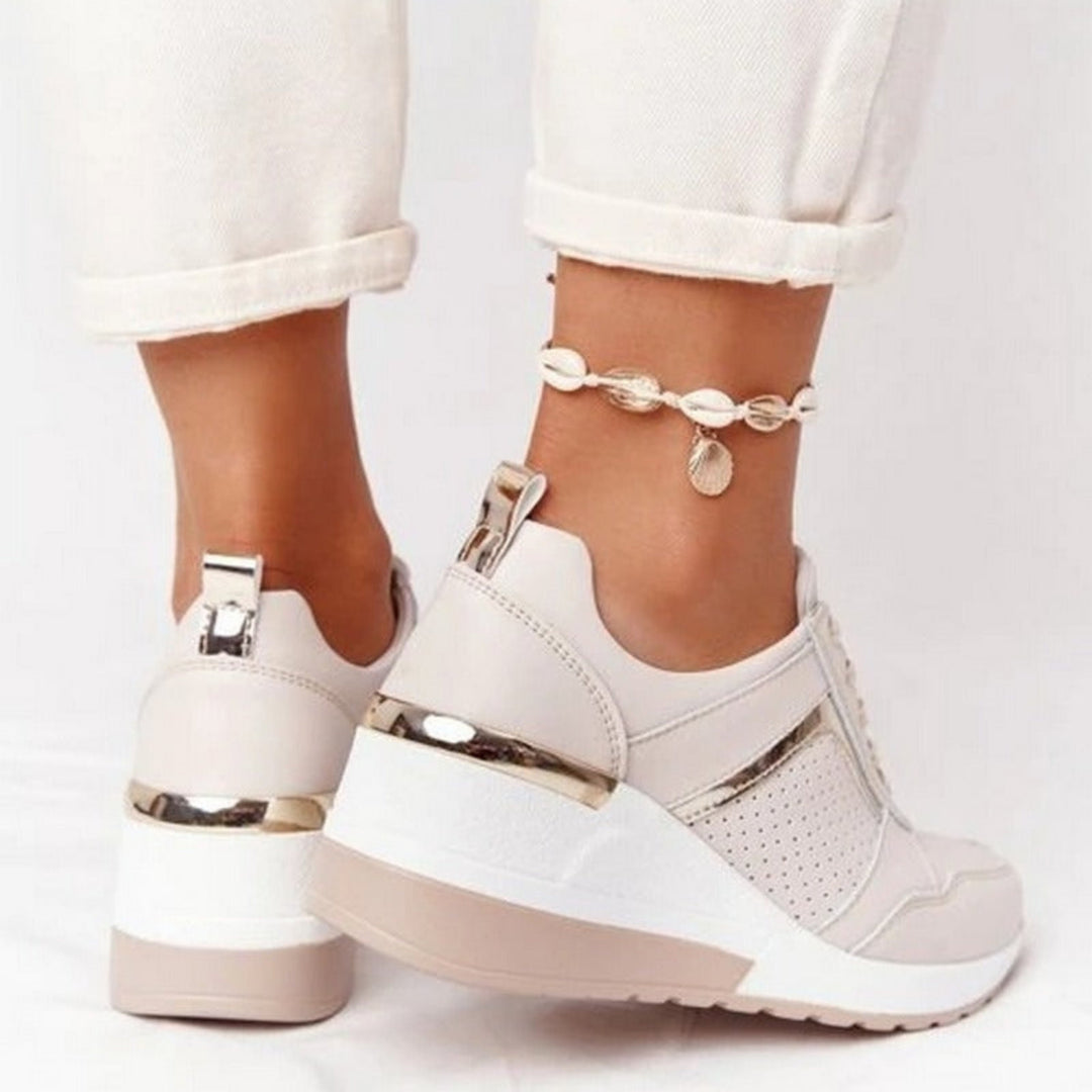 Komfortable fritidssko for kvinner: stilrene wedge sneakers med støttende kilesåle, perfekt for aktiv hverdag.