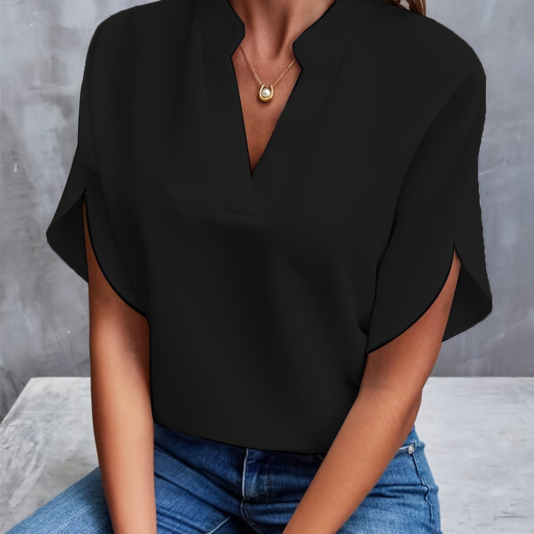 Komfortabel damebluse med blomstermønster, perfekt for casual sommerdager og fest.