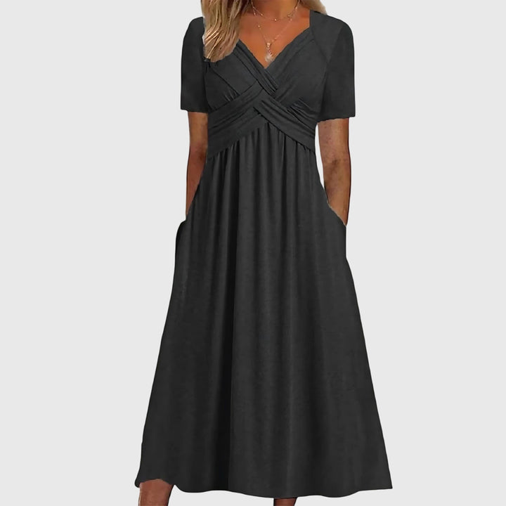 Moderne, elegant A-linje midikjole for kvinner. En lang kjole som passer til både sommer, fest og hverdagsmote.