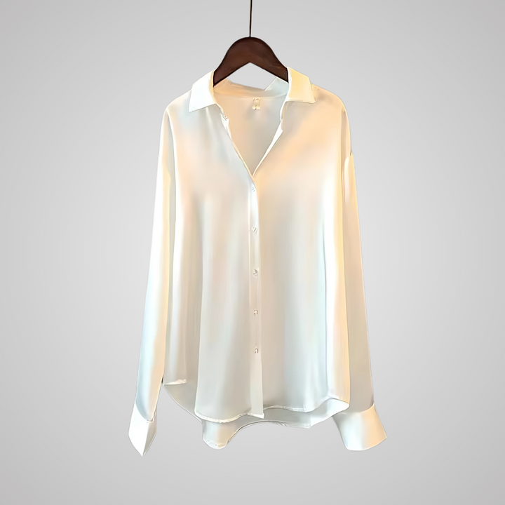 Moderne og elegant kvinnebluse som fremhever din stil. Perfekt for motebevisste kvinner, allsidig og komfortabel.