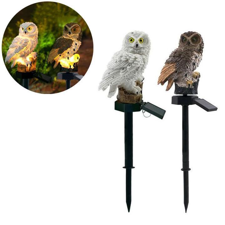 Dekorativ ugle solcellelampe for hage, skaper koselig atmosfære med LED-lys.