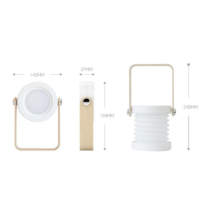 Foldy hvit/grå 7-i-1 LED-lampe vist i stående posisjon, som en moderne skrivebordslampe.
