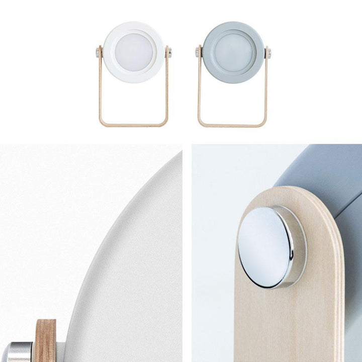 Robust hvit/grå Foldy campinglampe, 7-i-1 LED, med roterbart håndtak for utendørsaktiviteter.