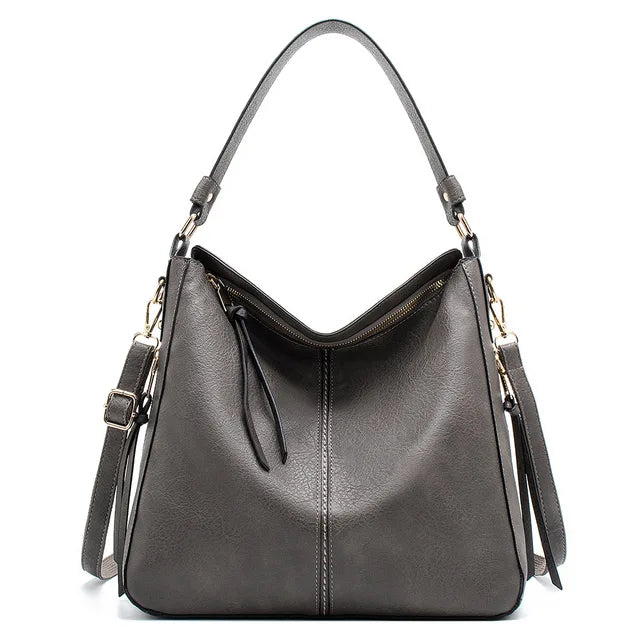 Crossbodyveske i elegant skinn. Romslig dameveske, luksuriøs skulderveske for moderne kvinner, perfekt tilbehør.