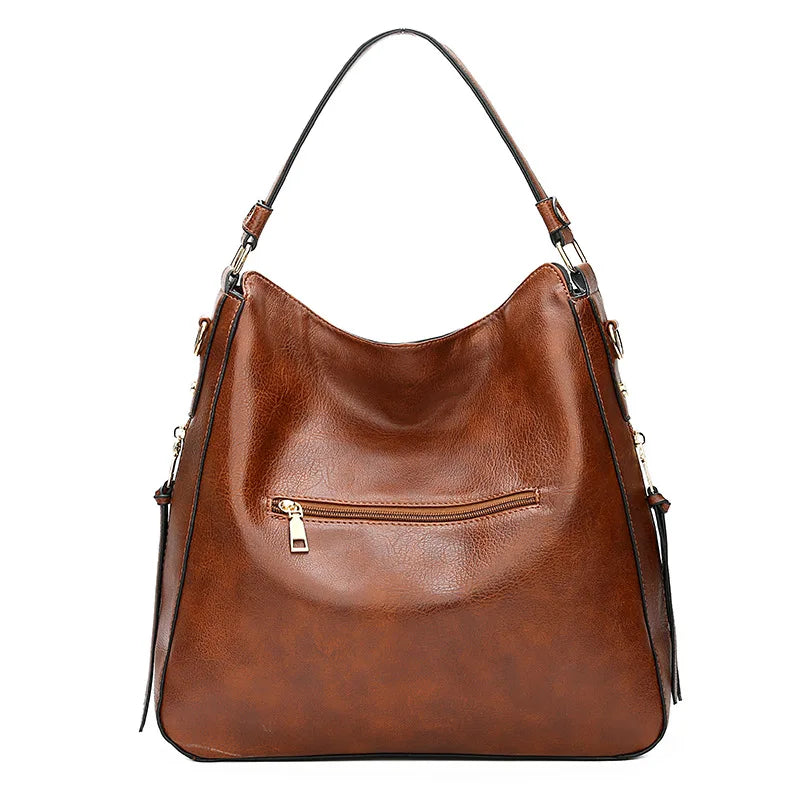 Luksuriøs dameveske i skinn. Elegant skulderveske, allsidig håndveske som rommer mye for motebevisste kvinner.