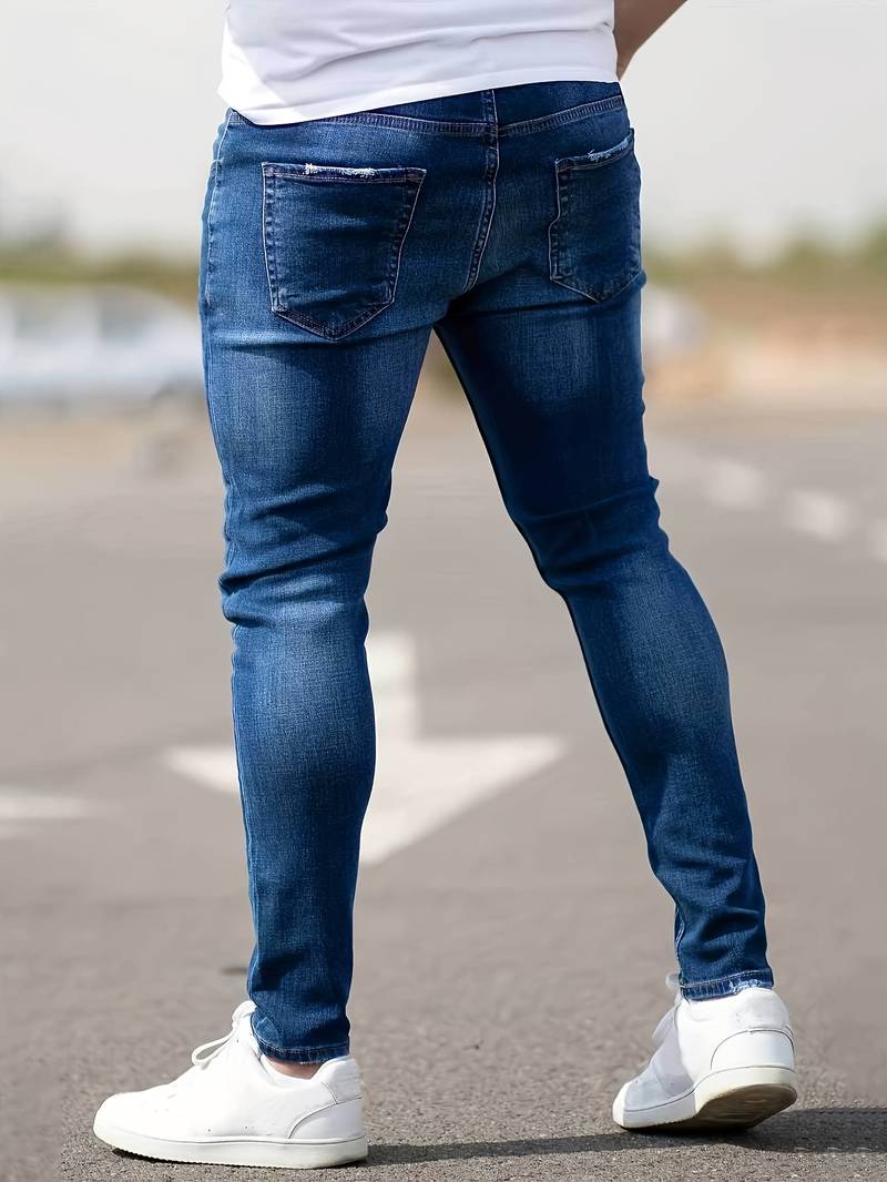 Moderne menns revne jeans, perfekt for en edgy og trendy look.