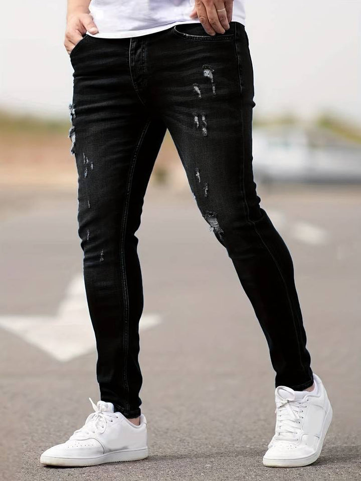 Menns blå revne jeans, stilig og komfortabel denim for hverdagsmote.