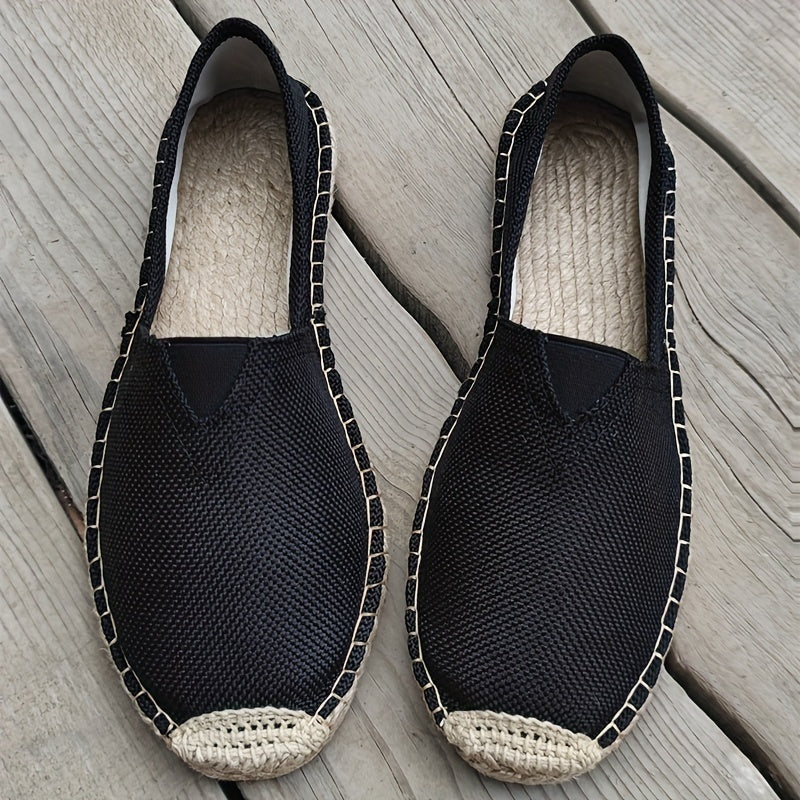 Detaljbilde: Den naturlige jutesålen på menns slip-on espadriller, sikrer komfort og stil.