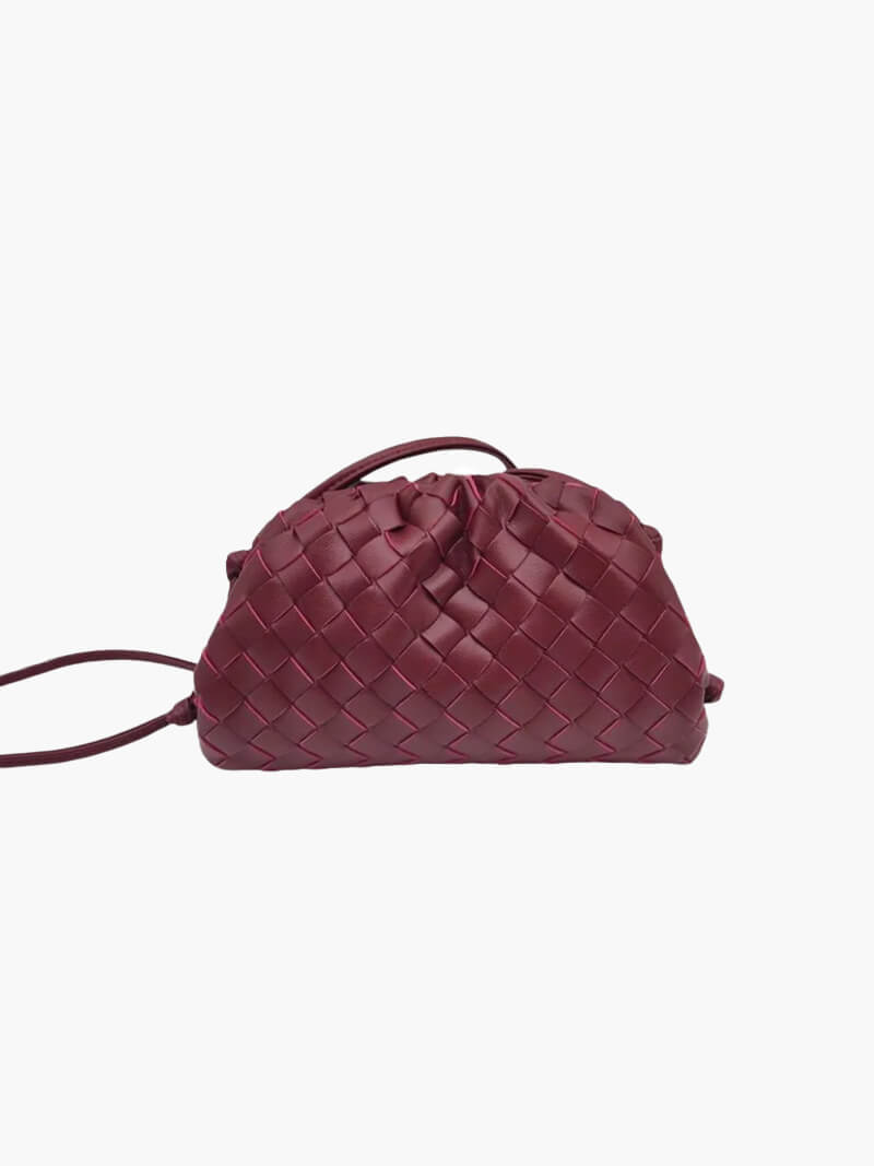 Bakside av elegant miniveske. Allsidig dameveske som skulderveske eller crossbody.