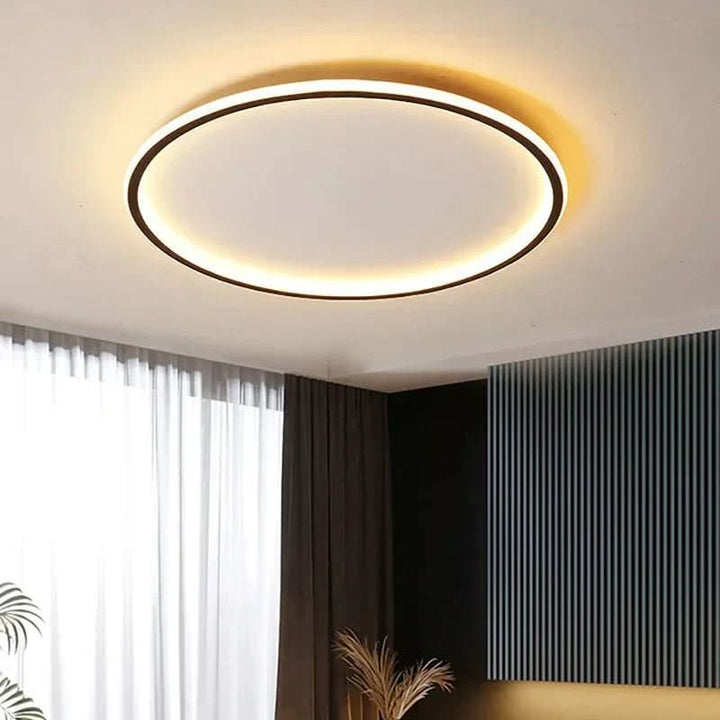 Dimbar, energieffektiv LED-taklampe i minimalistisk, skandinavisk design. Rund og stilren.