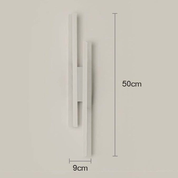 Minimalistisk LED vegglampe. Elegant innendørsbelysning som gir varmt stemningslys i gang eller soverom.
