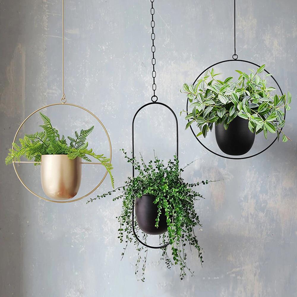 Elegant veggmontert planteholder for stue eller soverom. Minimalistisk design for moderne interiør.