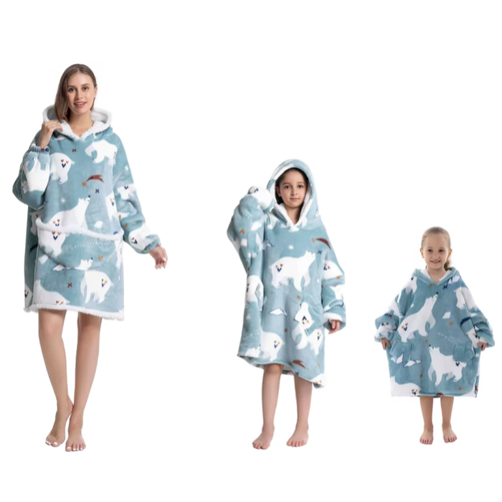 Varm, oversized kosegenser i rutete flanell, ideell for høstkvelder.