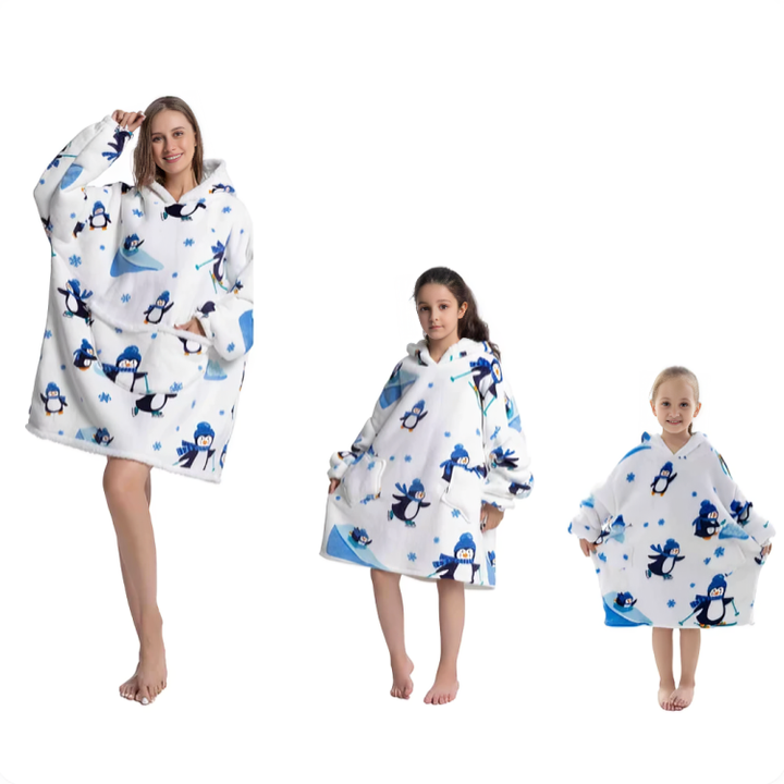 Gavetips: Supermyk oversized flanell hettegenser til hele familien.