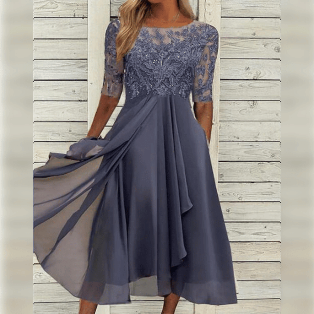 Chic festkjole for kvinner: elegant midi kjole med blonde og lett chiffon stoff.