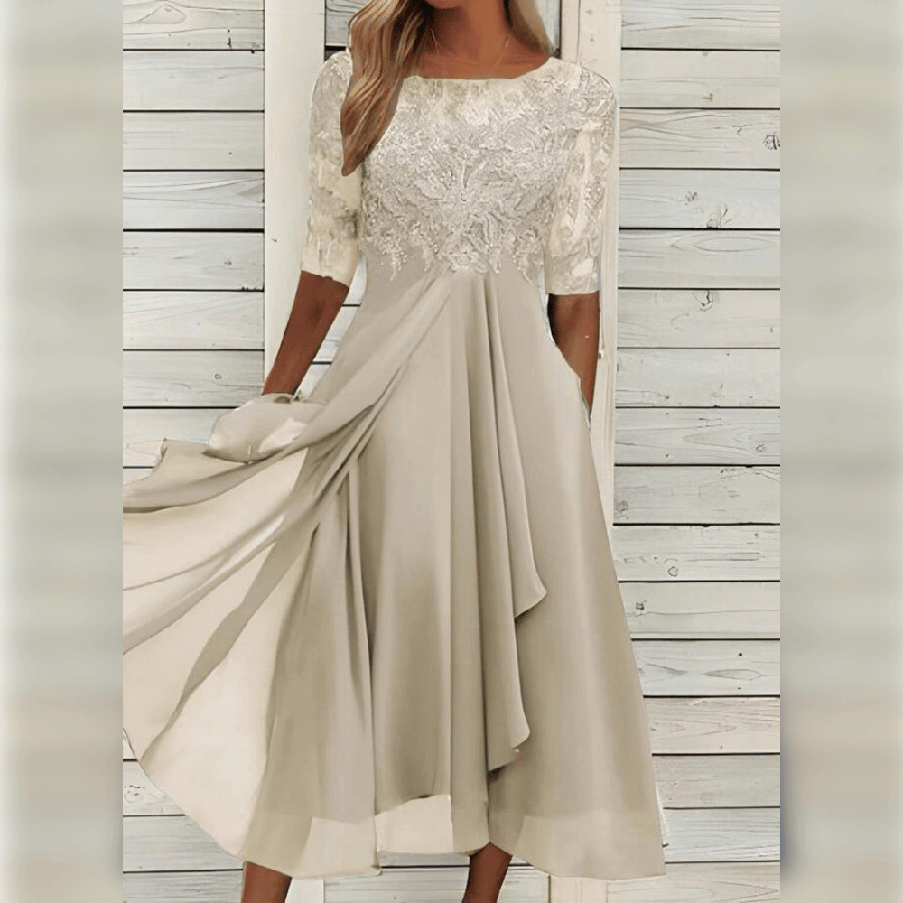 Kvinne i elegant blonde & chiffon midi kjole, ideell for sommerfest og spesielle anledninger.