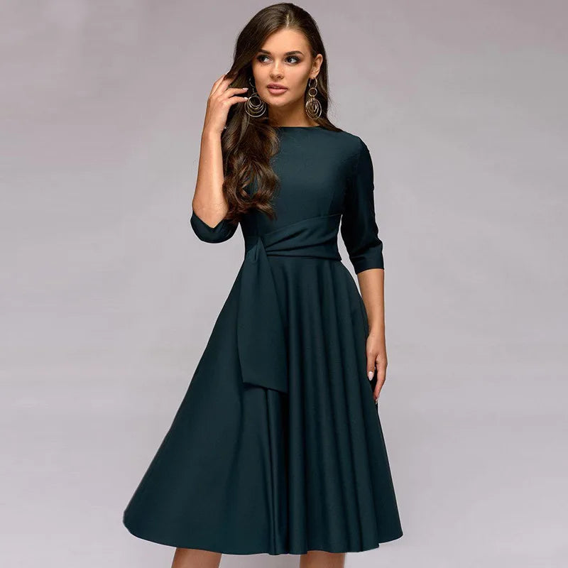 Khaki elegant midikjole i swing-stil for dame. Allsidig sommer- og festkjole i polyester.