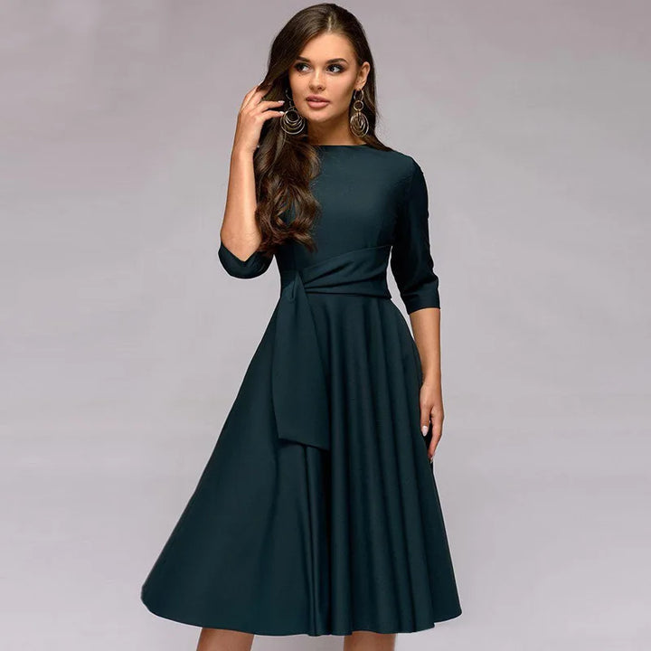 Khaki elegant midikjole i swing-stil for dame. Allsidig sommer- og festkjole i polyester.