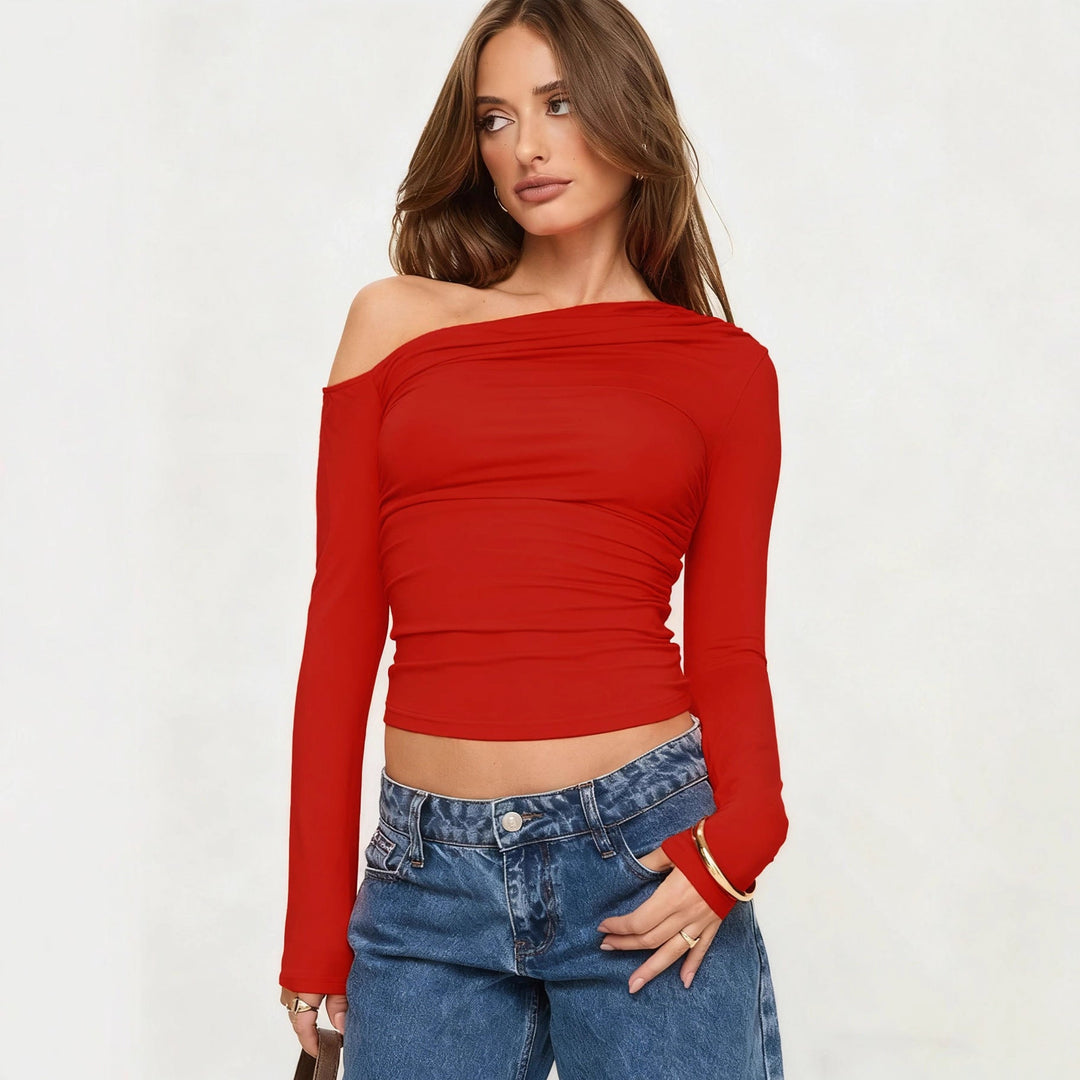 Elegant off-shoulder rynkeskjorte for dame. Allsidig langermet topp, perfekt for både fest og hverdag.