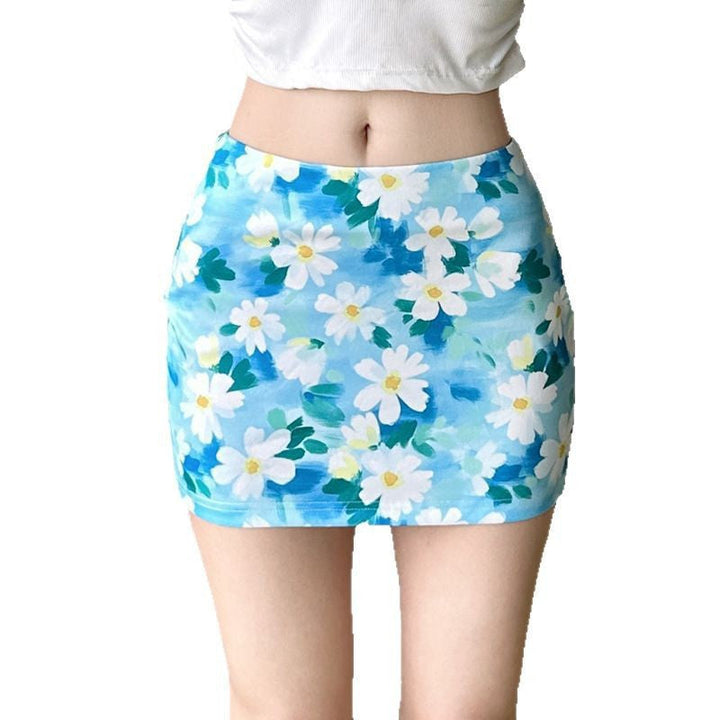 Trendy blomstret miniskjørt med behagelig elastisk linning for dame, perfekt for en uformell og frisk look.