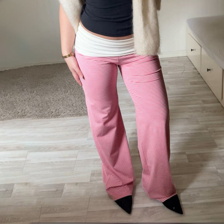 Avslappede stribete damebukser med elastisk midje, perfekt for komfortabel fritid og casual stil.