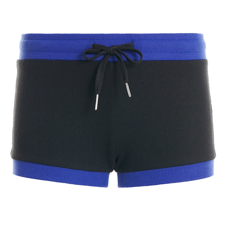 Sporty dame shorts for trening og fritid, med komfortabel elastisk linning og snor.