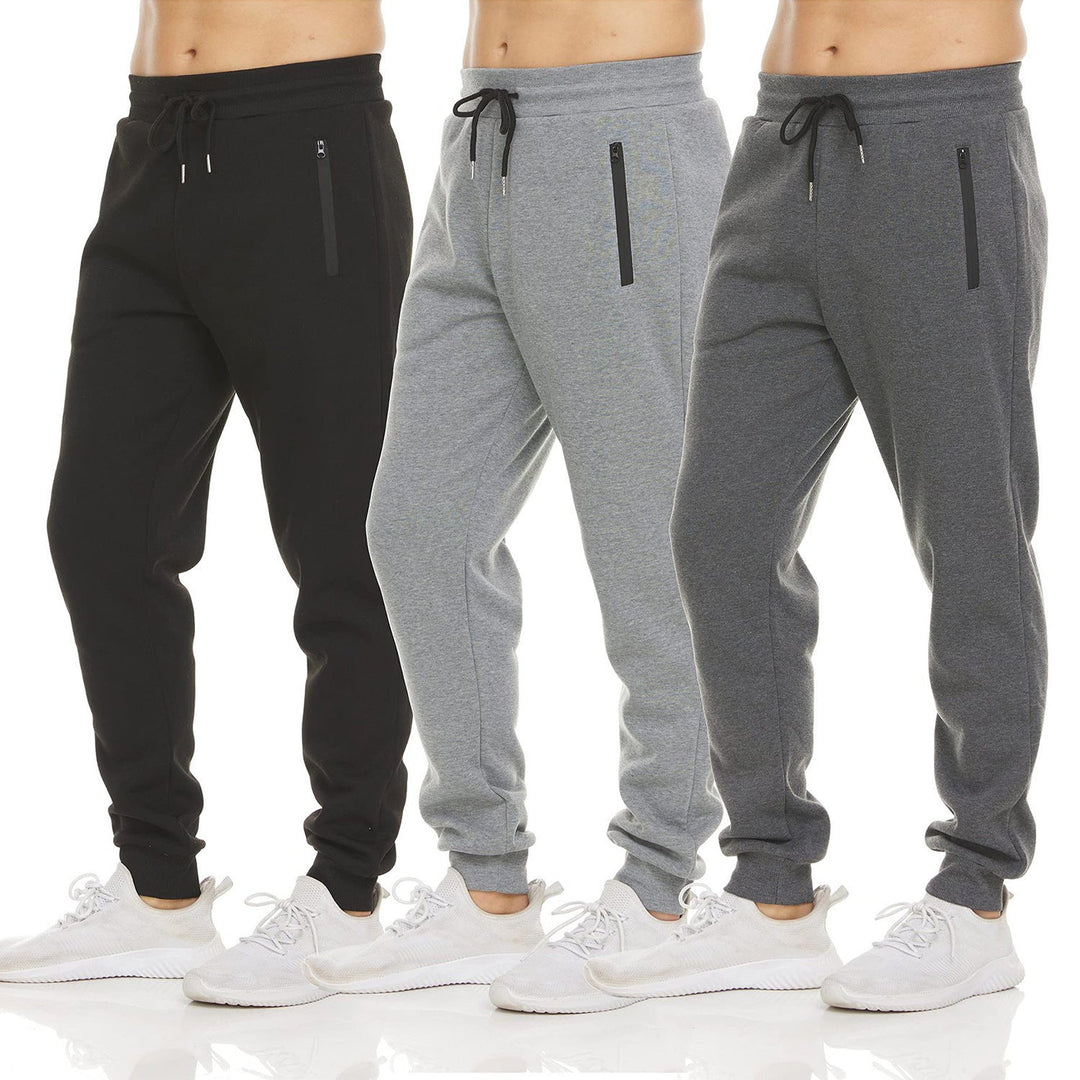 Mørkegrå herre joggebukse med glidelåslommer og justerbar midje, perfekt for sport og fritid.