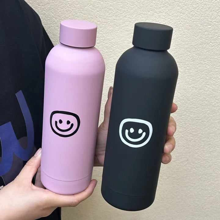 Moderne 500ml smiley termosflaske for kvinner. Rustfritt stål, holder drikken varm/kald lenge.