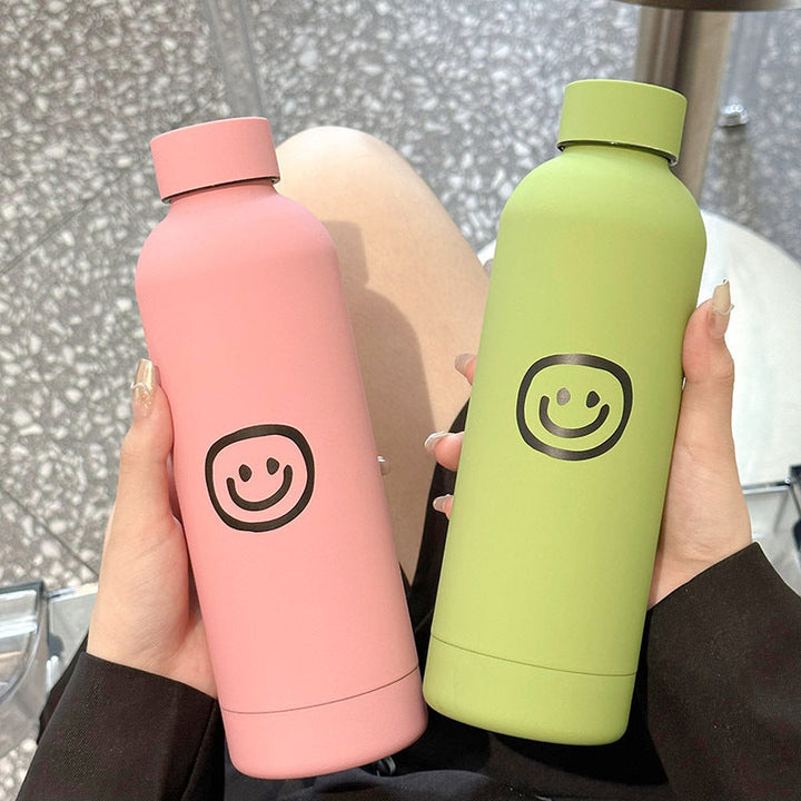Isolert drikkeflaske 500 ml med morsomme emoji-design. Perfekt termoflaske for kvinner på farten.