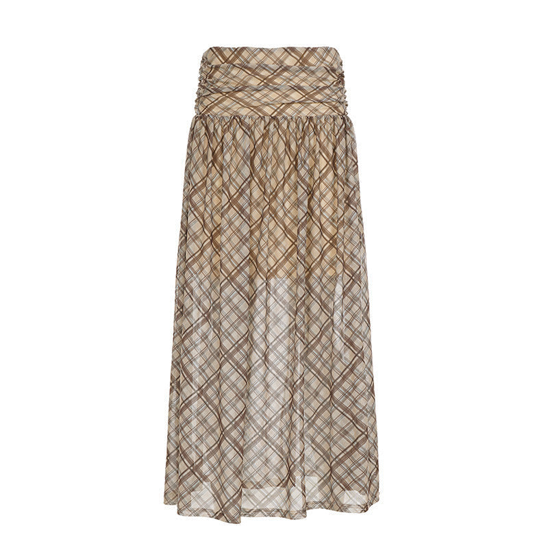 Avslappet og elegant brunt rutete maxiskjørt for dame med elastisk midje, perfekt for komfortabel stil.