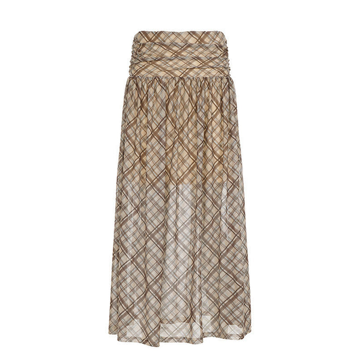 Avslappet og elegant brunt rutete maxiskjørt for dame med elastisk midje, perfekt for komfortabel stil.