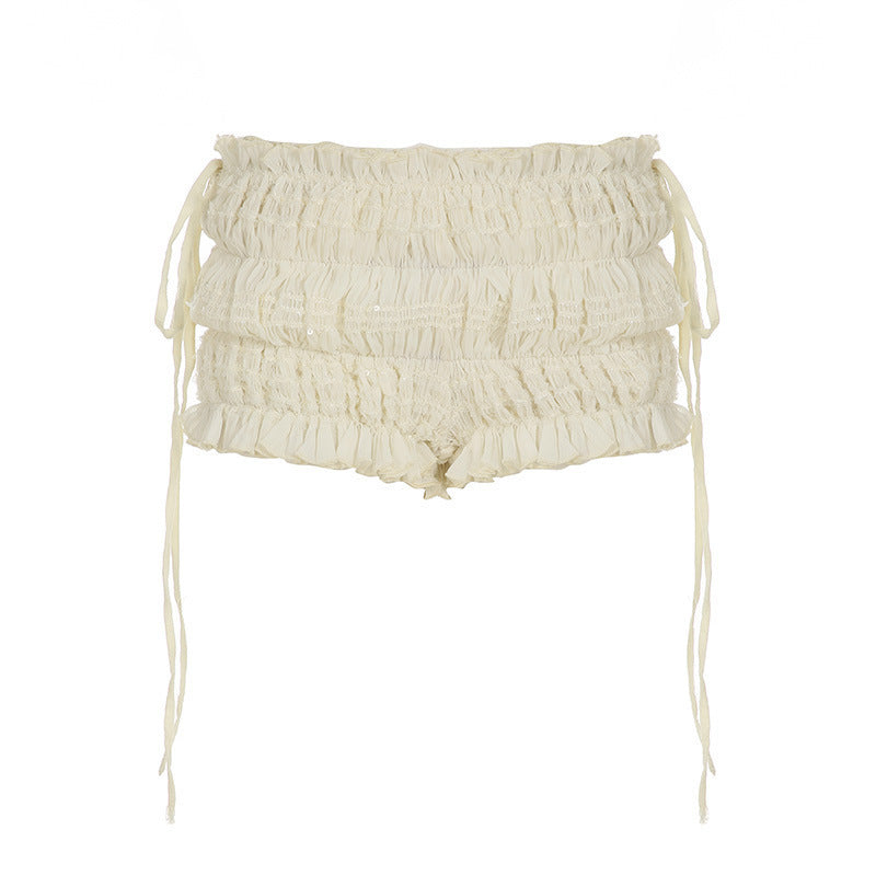 Lette dame rysjshorts med justerbare bånd, perfekte sommershorts for en avslappet og feminin look.