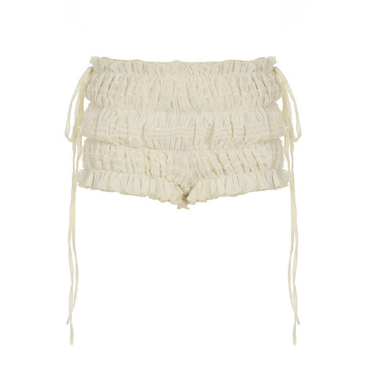Lette dame rysjshorts med justerbare bånd, perfekte sommershorts for en avslappet og feminin look.