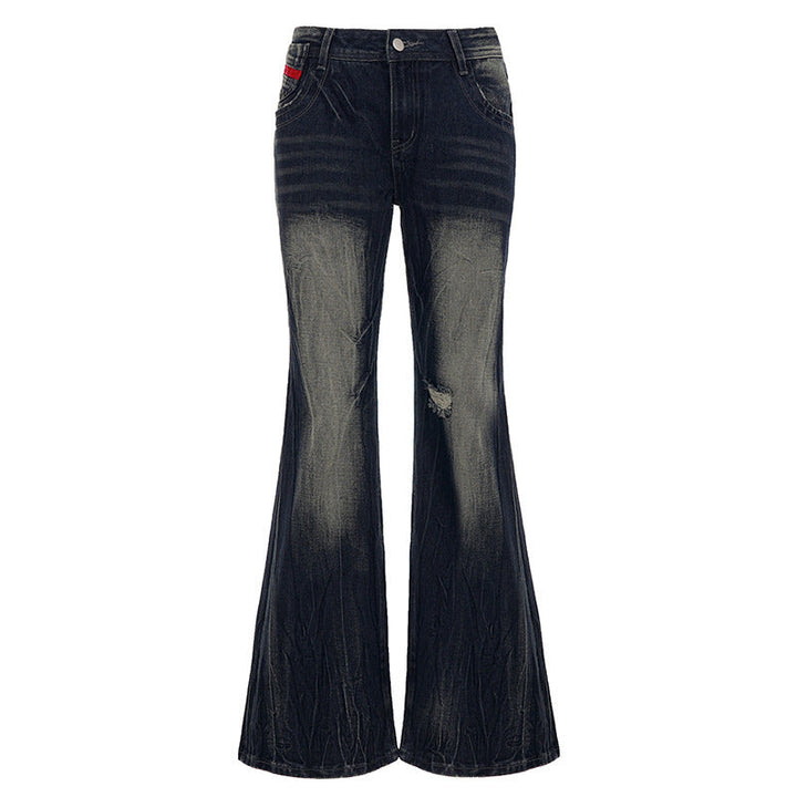 Allsidige blå damejeans med flared ben og trendy slitasje, ideell for hverdag og en uformell stil.