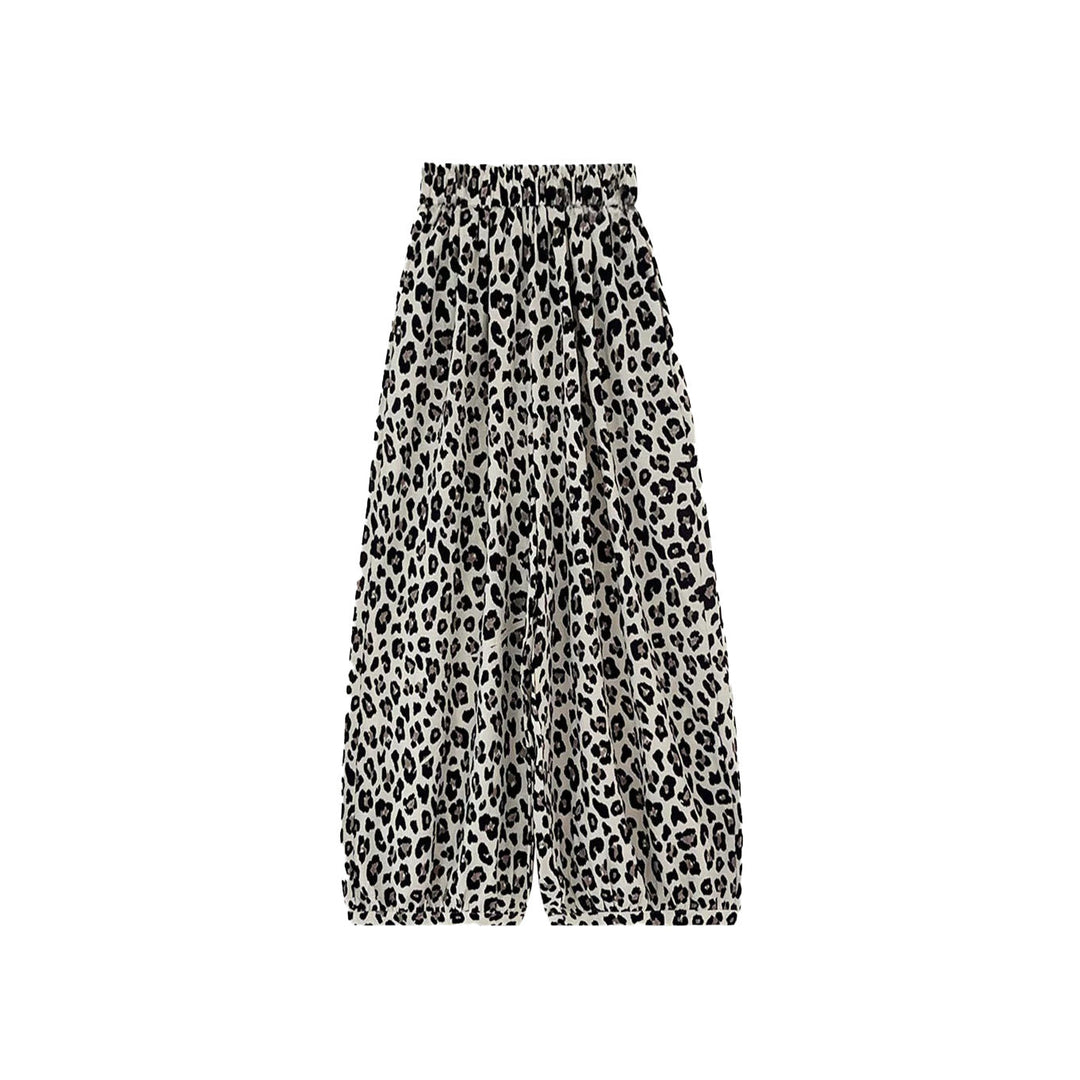 Moteriktig leopardmønstret dameskjørt med bredt snitt, elastisk midje og flytende fall, trendy for sommeren.