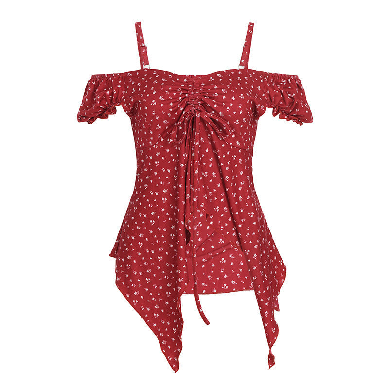 Stilig off-shoulder dame topp med blomstermønster, perfekt som rynket hverdagsoverdel til vår/sommer.