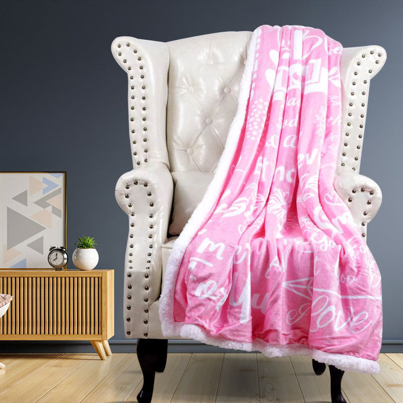 Komfortabelt pledd i myk polyester, designet for dame, perfekt til stuen eller soverommet.
