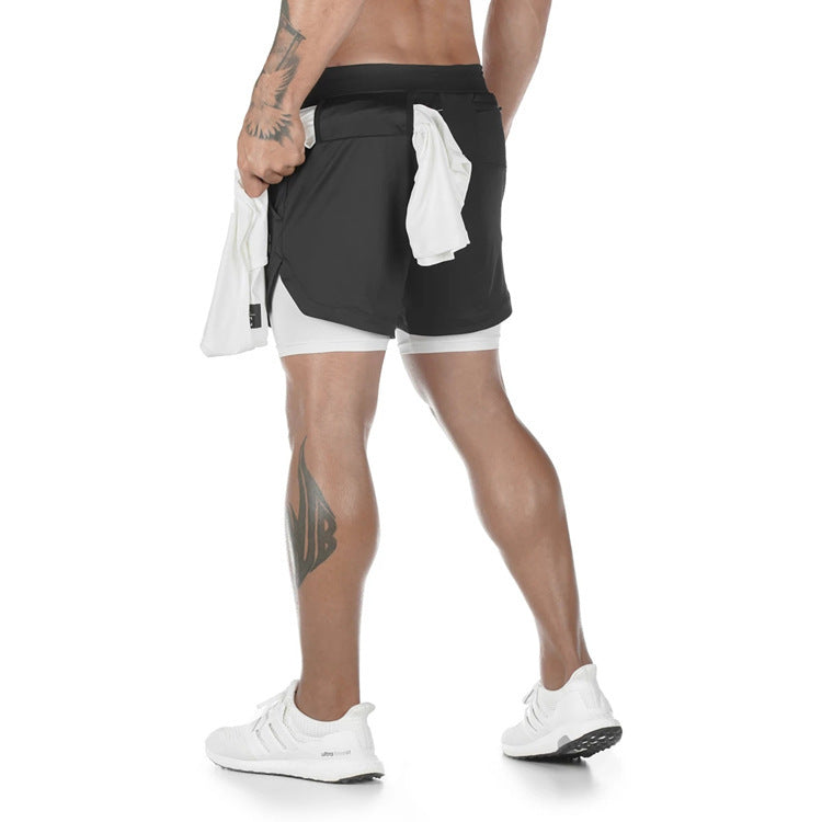 Herre 2-i-1 aktivt tøy shorts, ideell for gym og allsidig herretrening. Kombinerer stil med fuktighetsdrenerende ytelse.